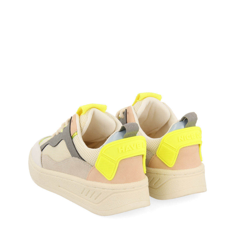Sneakers blancas con toques de color en amarillo neón para niña eritras