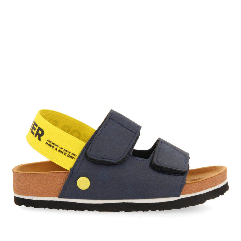 Chanclas estilo bio color azul marino con detalles en amarillo para niño courgis