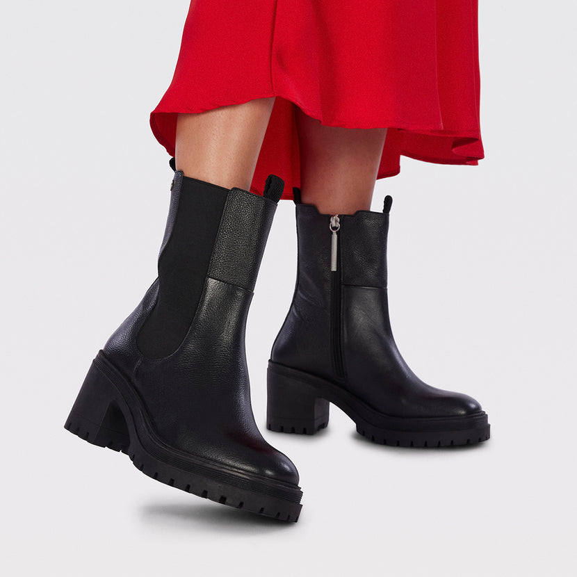 Botín negro tipo chelsea con elásticos laterales y piso track con tacón para mujer horsens