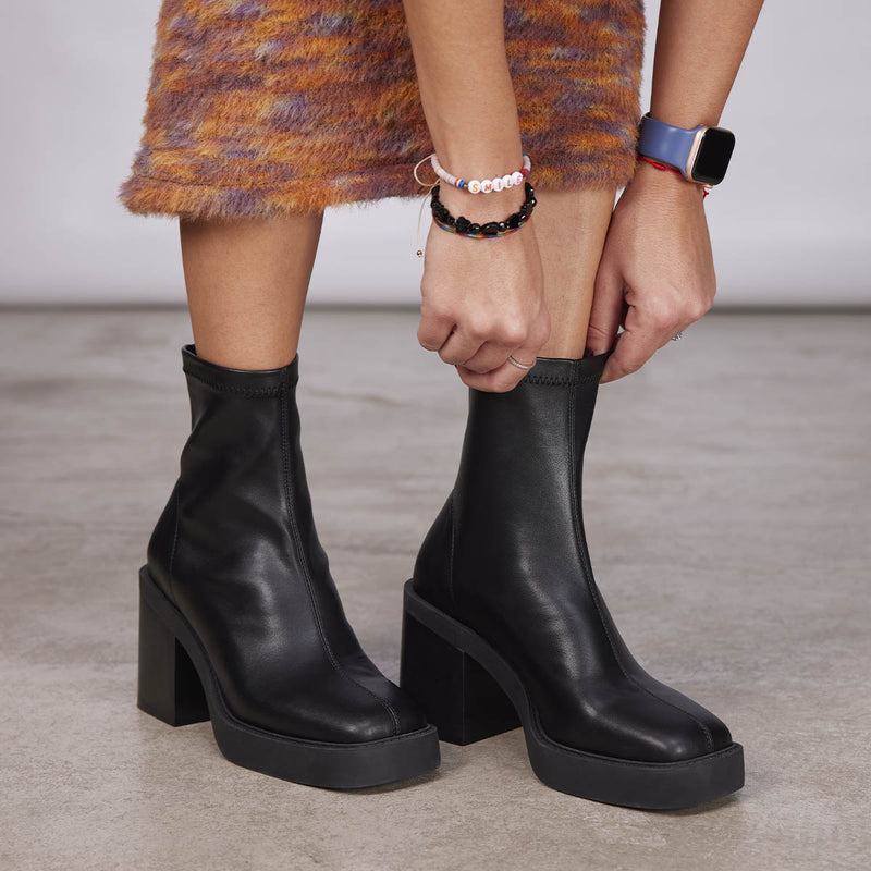 Nyelv women's stretchy black platform boots