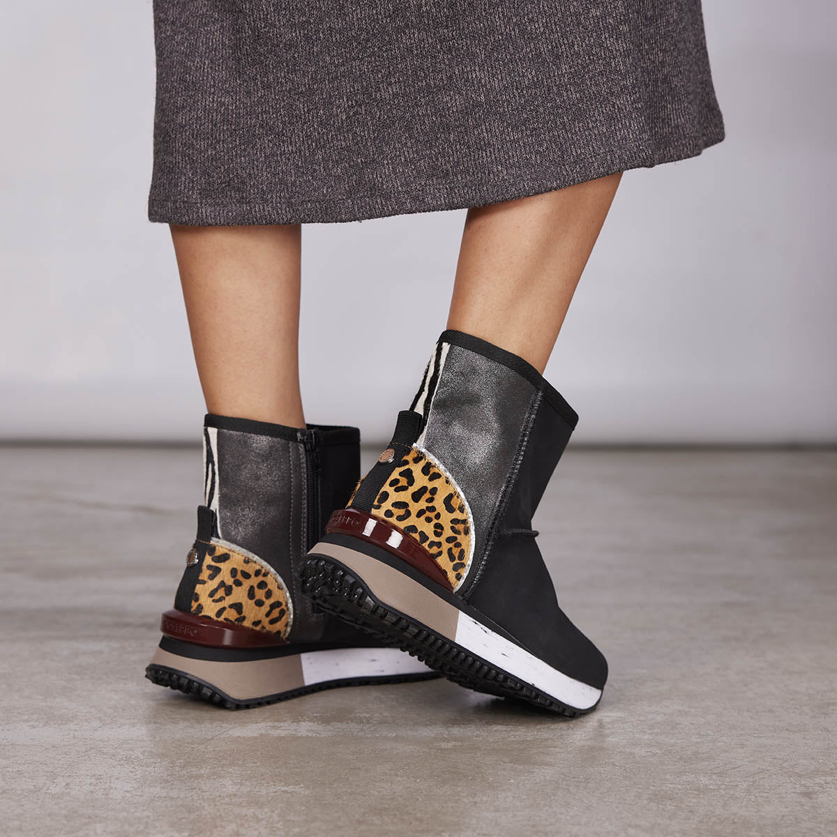 Dunoon women's black shearling boot-style sneakers with details