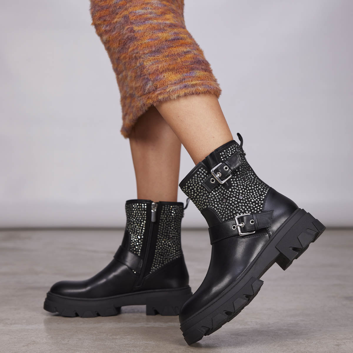 Tyndall women's black biker boots with decorations, buckles and track soles
