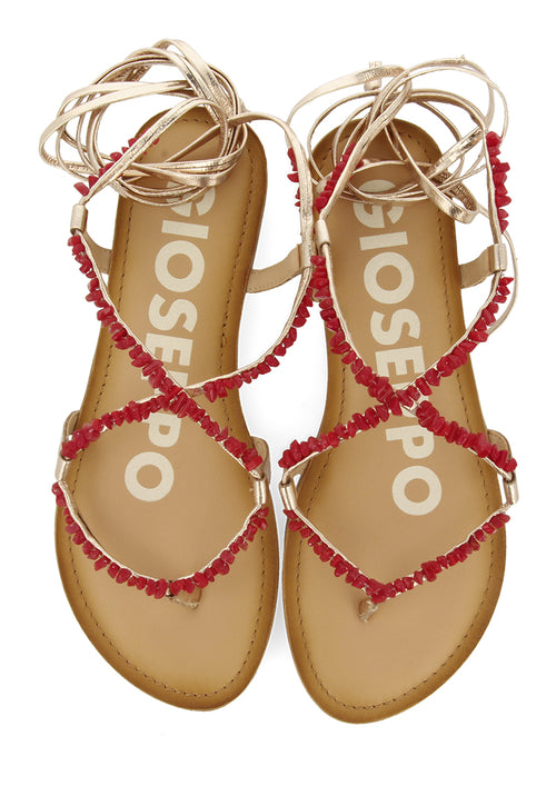 SANDALIAS DE PIEL COLOR DORADO CON ADORNOS EN ROJO PARA MUJER LISIEUX