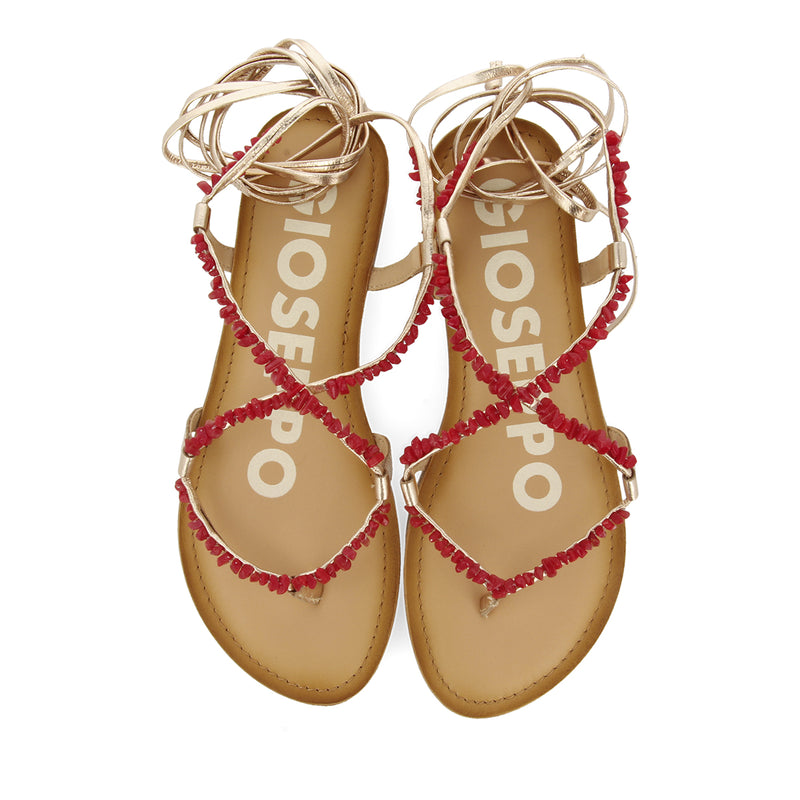 SANDALIAS DE PIEL COLOR DORADO CON ADORNOS EN ROJO PARA MUJER LISIEUX