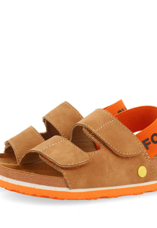 Courgis boys tan footbed sandals with orange details and text