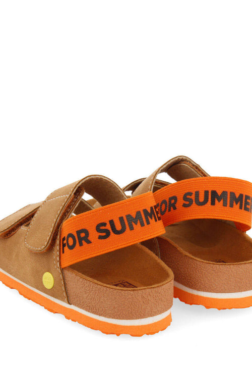 Courgis boys tan footbed sandals with orange details and text