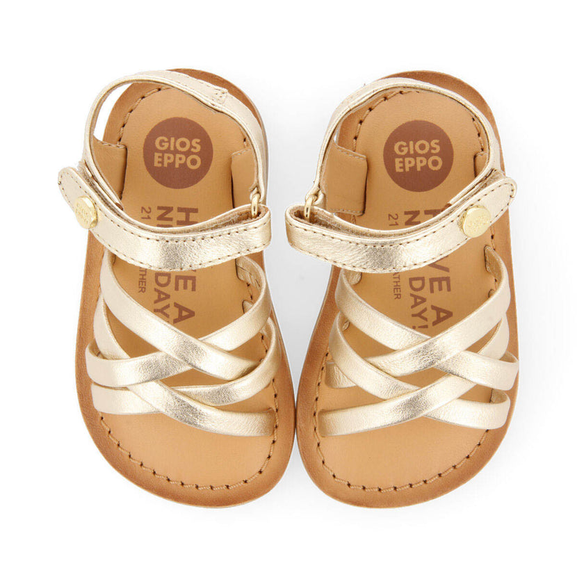 Sandalias de piel en color oro para niña coiniza