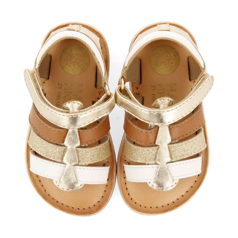 Sandalias de piel tipo cangrejeras en color oro para niña soacha