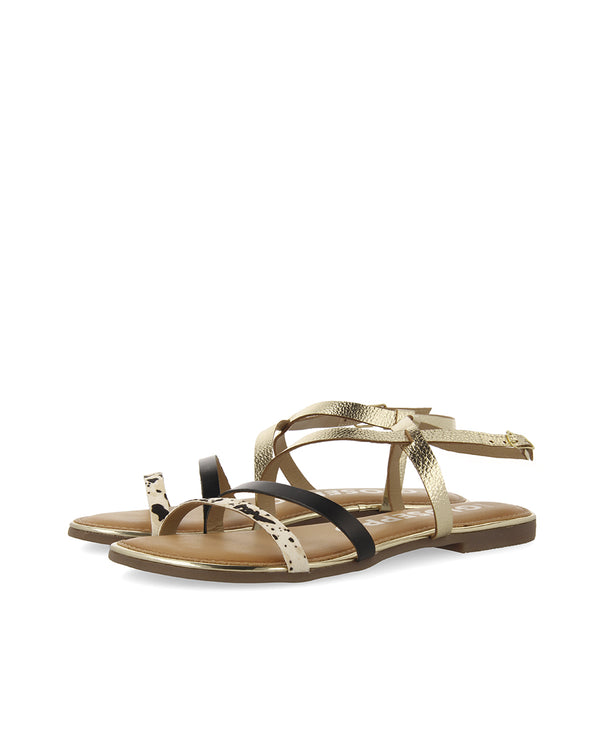 Sandalias con tiras en color dorado y estampado de vaca para mujer megara