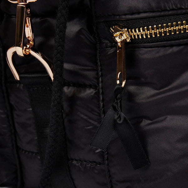 Quinsac women's black cushioned backpack with accessories