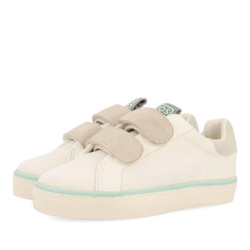 Sneakers blancas con base de rejilla para niña joaima