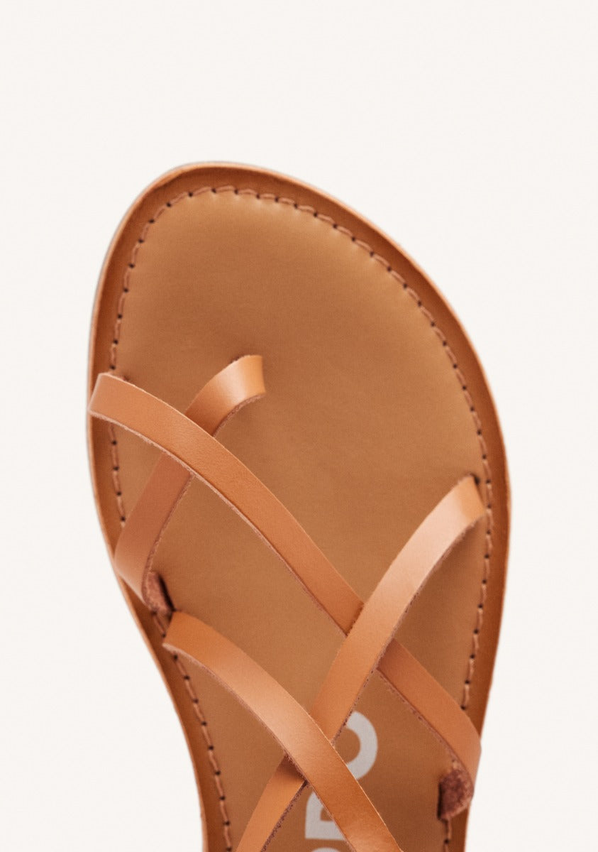 Lussat sandals with thin tan straps to tie around the leg