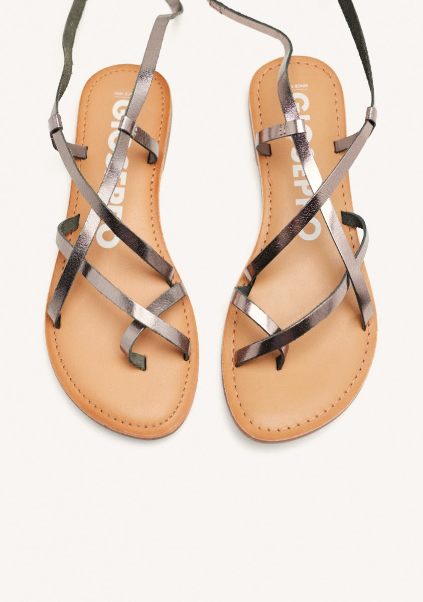 Lussat sandals with thin dark silver straps to tie around the leg