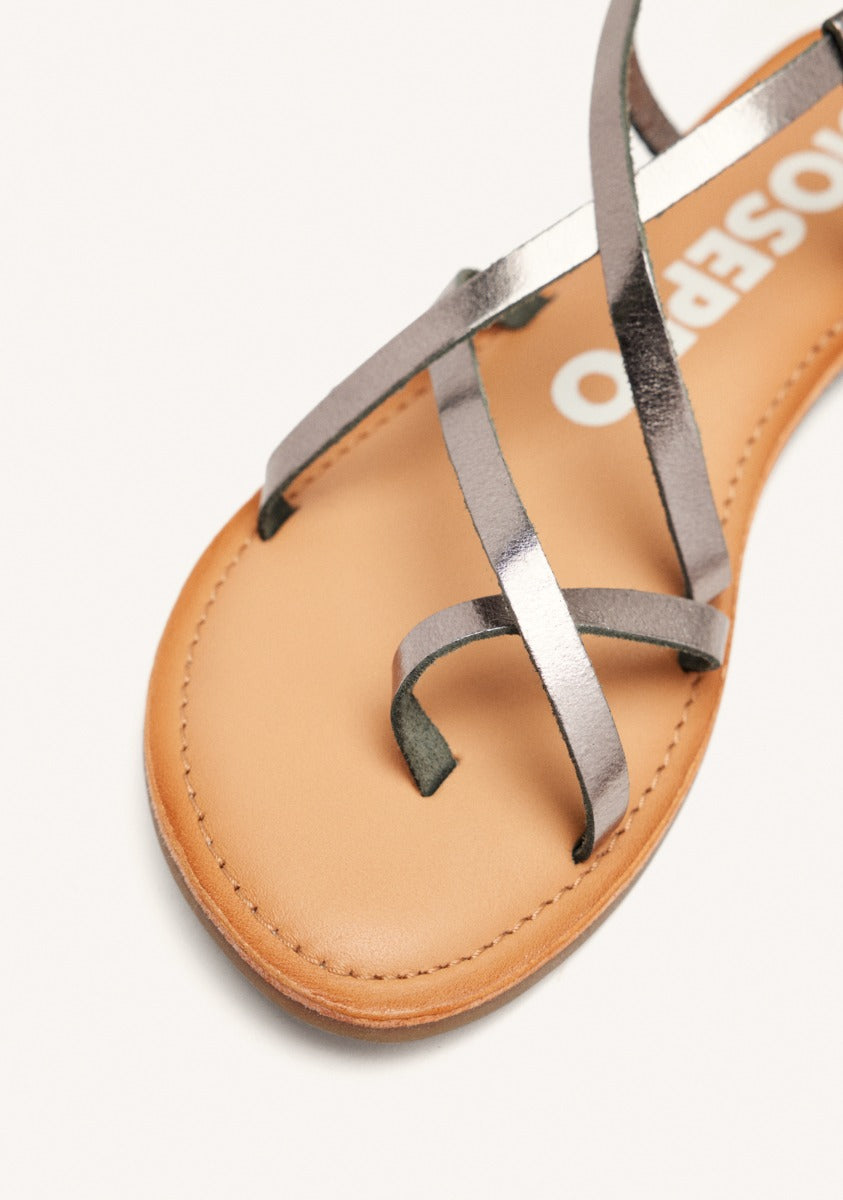 Lussat sandals with thin dark silver straps to tie around the leg