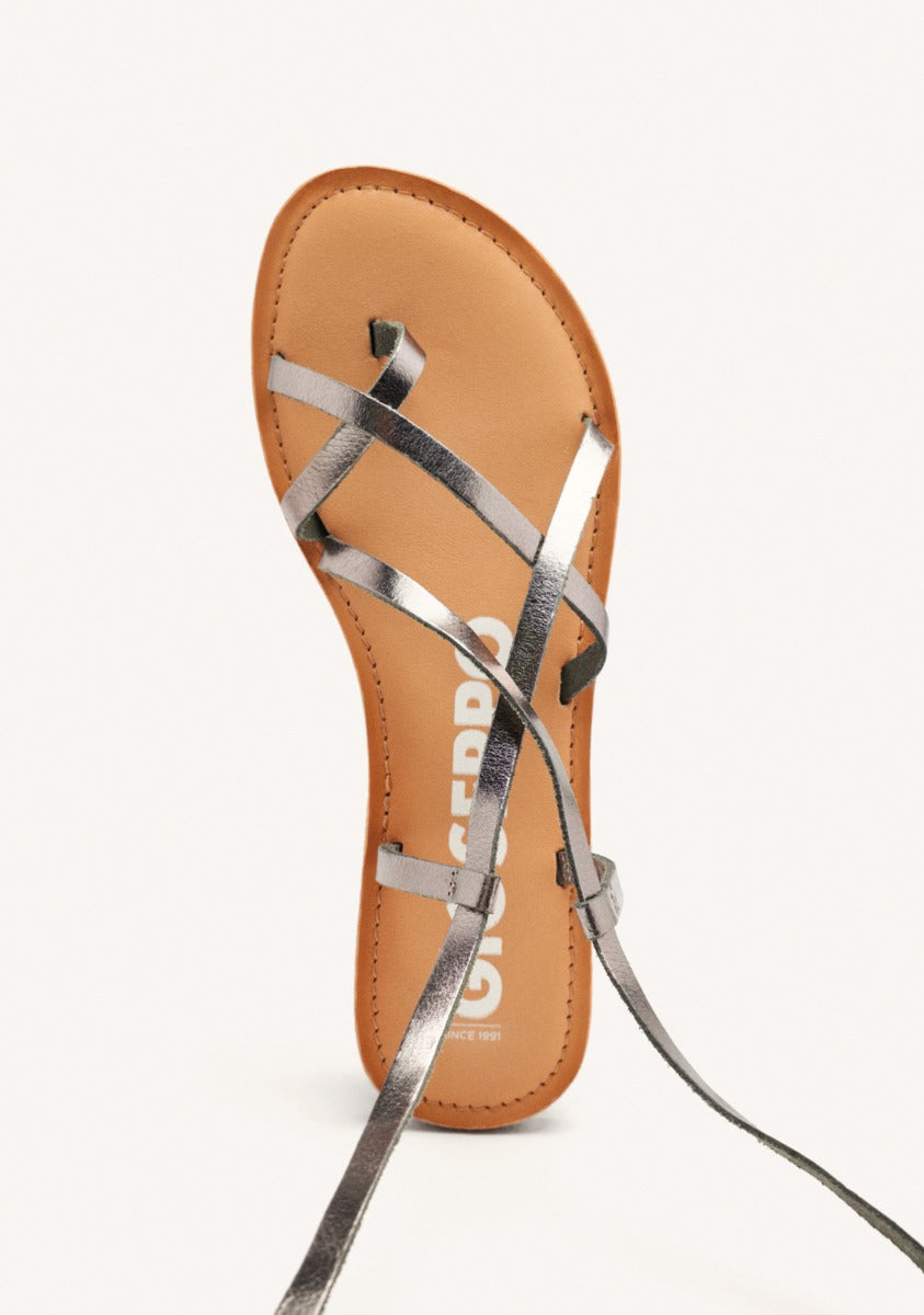 Lussat sandals with thin dark silver straps to tie around the leg