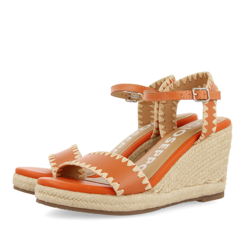 Sandalias de piel color naranja con pespuntes y cuña de yute para mujer neiva 