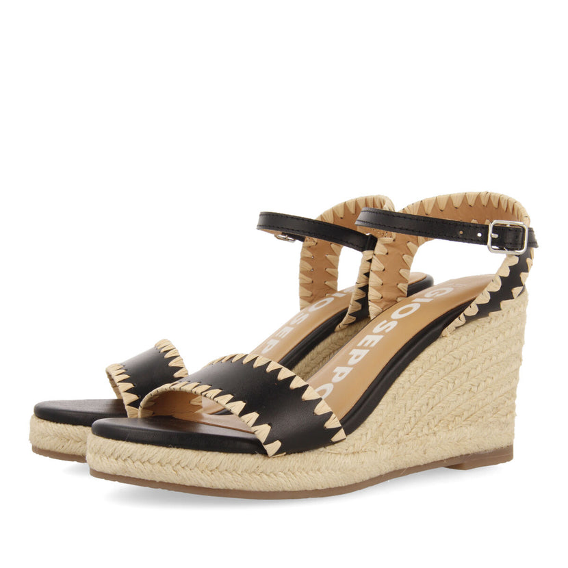 Sandalias de piel color negro con pespuntes y cuña de yute para mujer neiva 