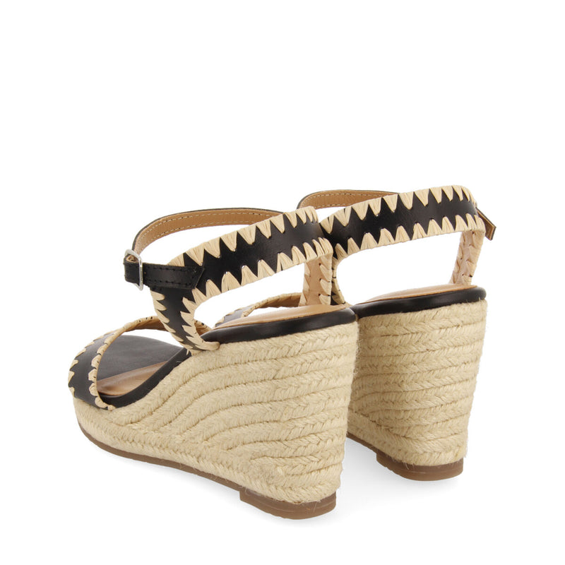 Sandalias de piel color negro con pespuntes y cuña de yute para mujer neiva 