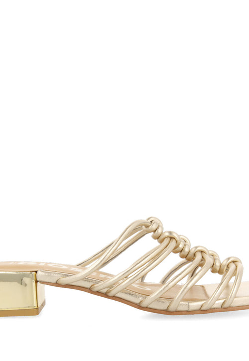 Kupang women's gold leather sandals with low heels and straps with knots