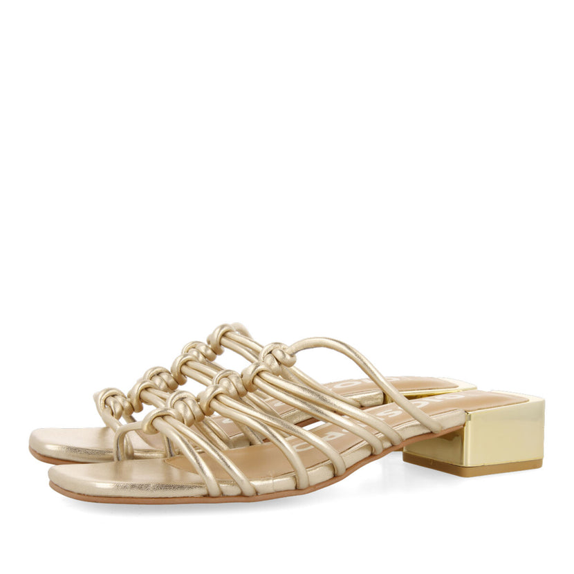 Kupang women's gold leather sandals with low heels and straps with knots