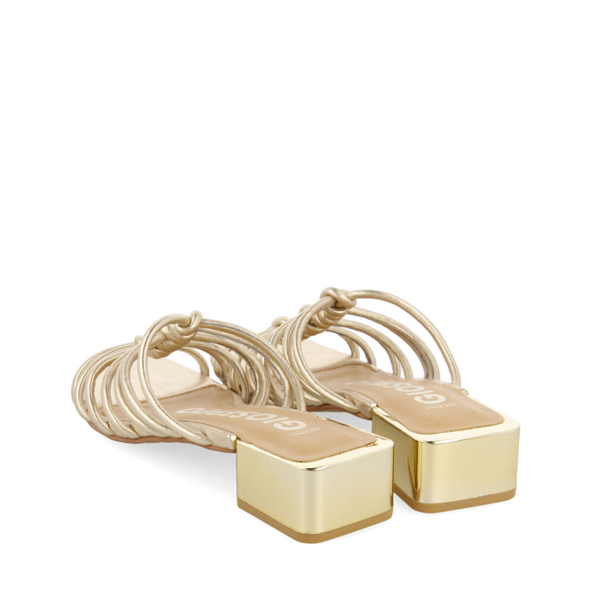 Kupang women's gold leather sandals with low heels and straps with knots