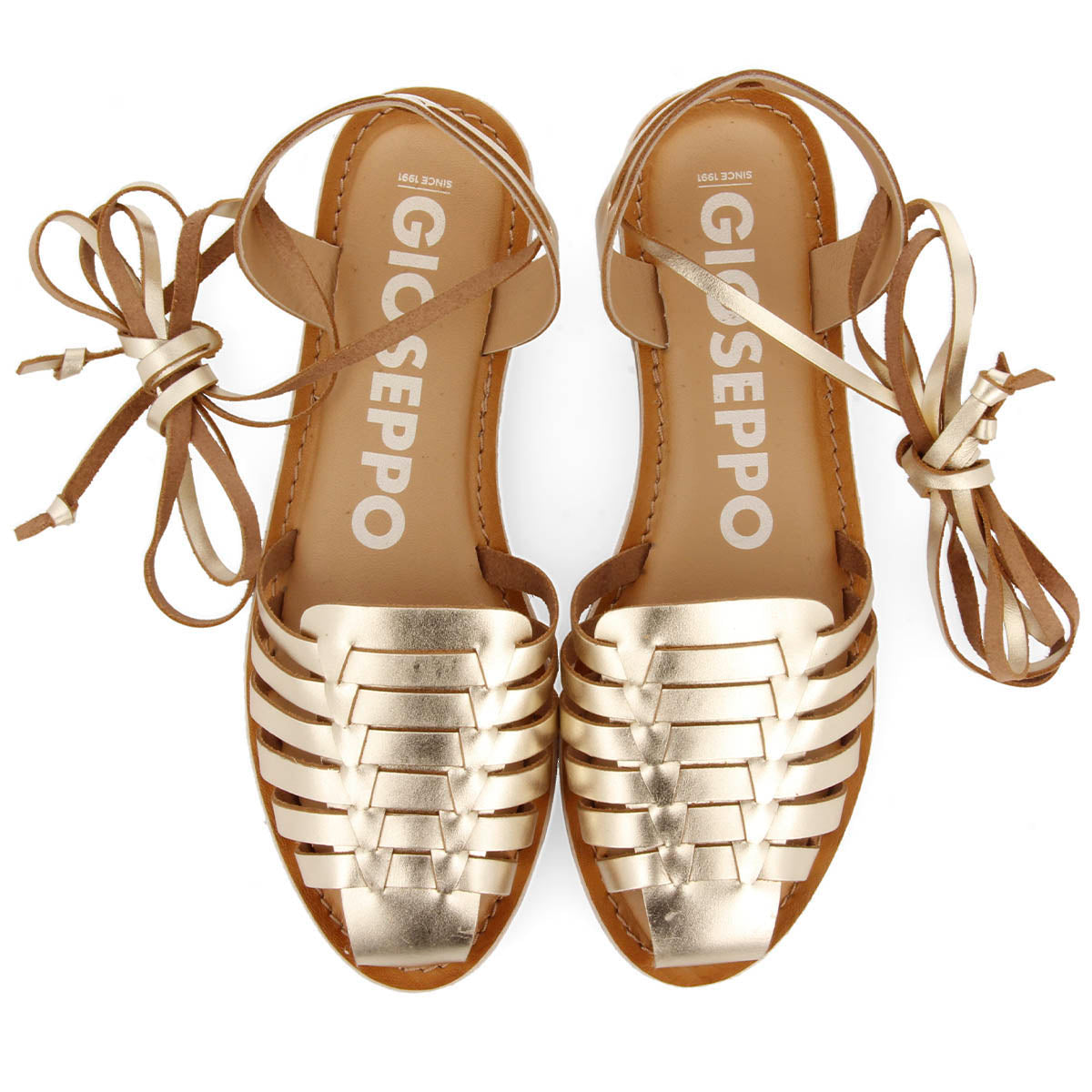 Sandálias douradas com aberturas de estética romana com cordões para mulher ransart