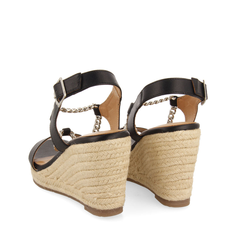 Sandalias negras de piel con detalle de cadena y cuña de yute para mujer looze