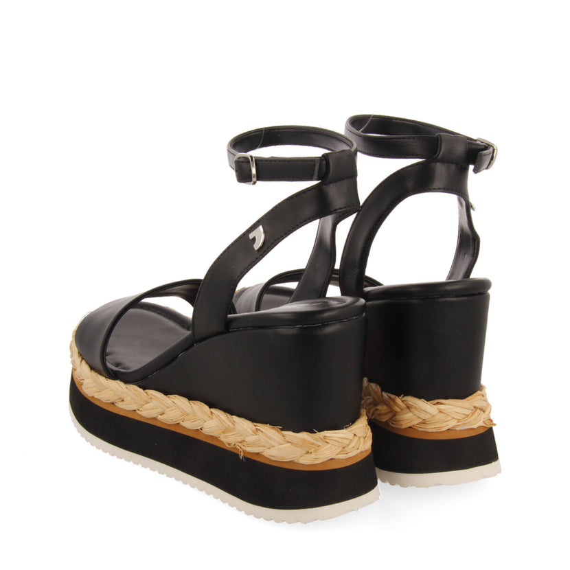 Sandalias color negro con cuña y detalle trenzado para mujer arniquet 