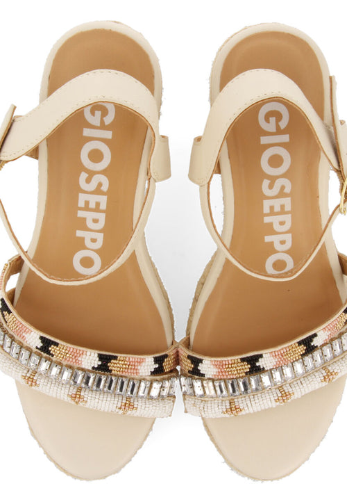 Bacoor women's white sandals with decorative tassels and jute wedges