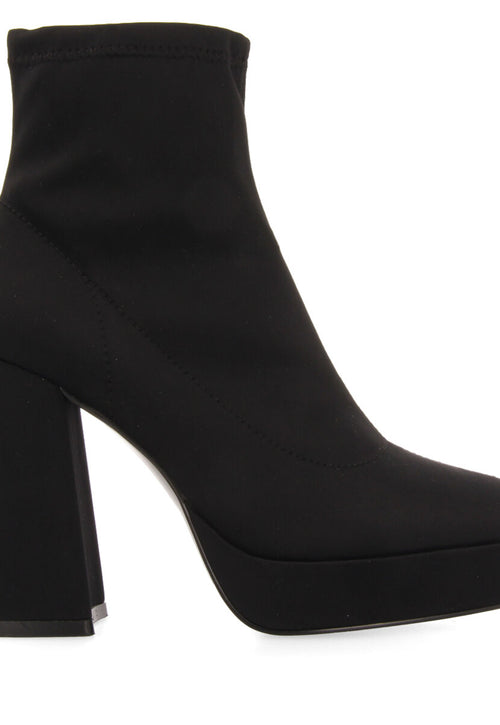 Turenki women's black ankle boots with wide heels and platforms