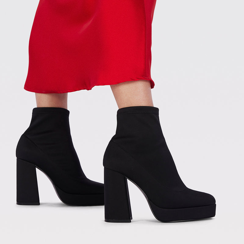 Turenki women's black ankle boots with wide heels and platforms