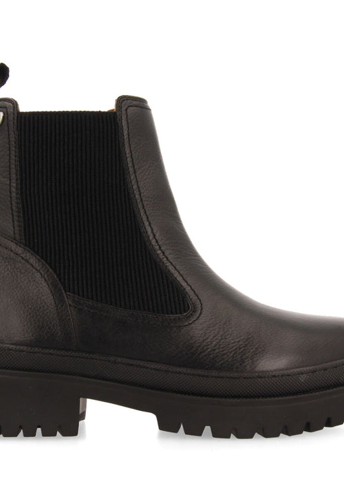 Botín negro tipo chelsea con elásticos laterales y piso track en piel para mujer langen