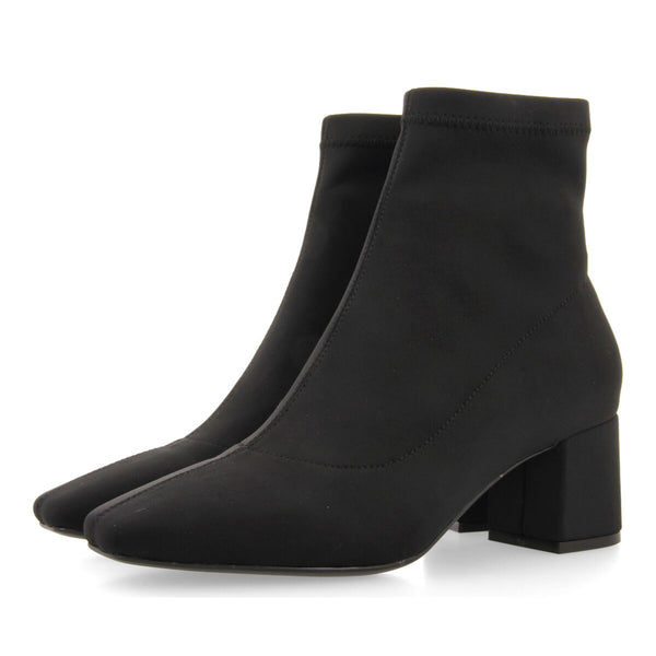 Bottines noires à talon moyen et bout semi-carré en matière élastique pour femme letham
