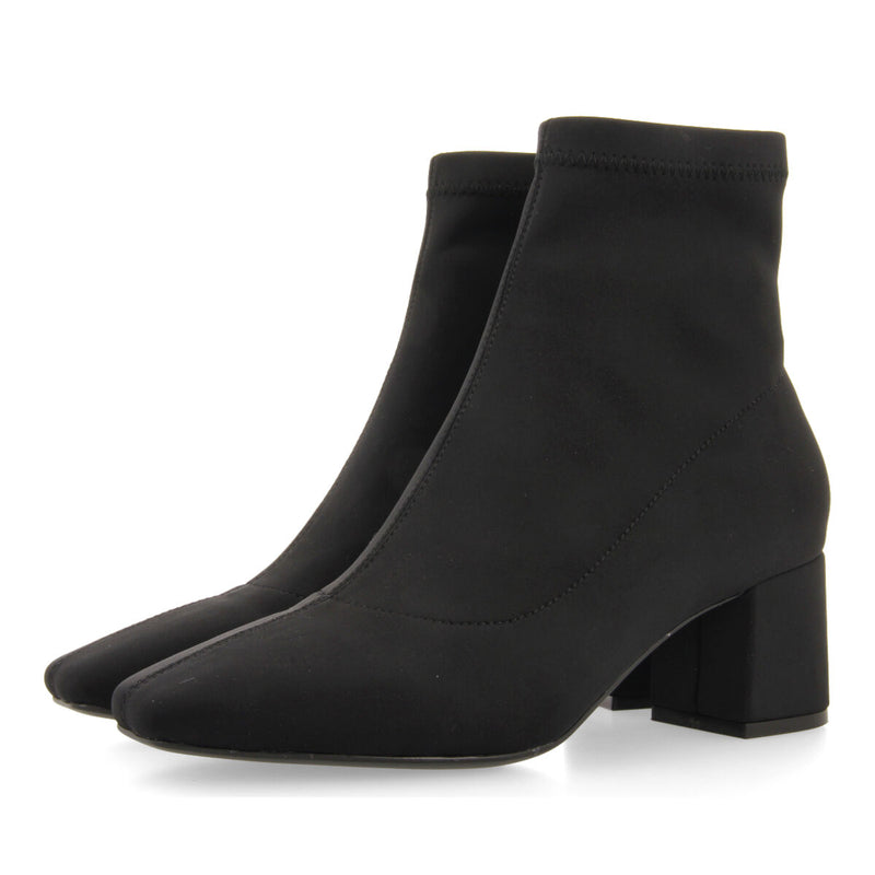 Bottines noires à talon moyen et bout semi-carré en matière élastique pour femme letham