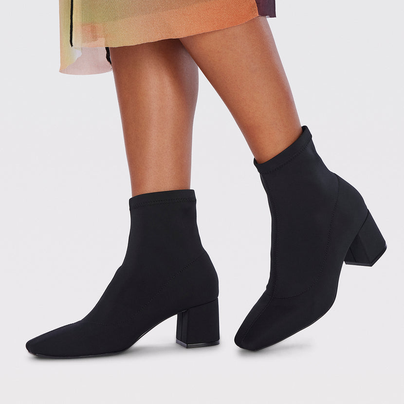 Bottines noires à talon moyen et bout semi-carré en matière élastique pour femme letham