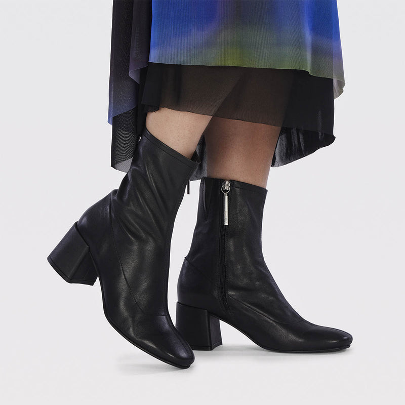Artas women's black leather ankle boots with mid heels and round toes