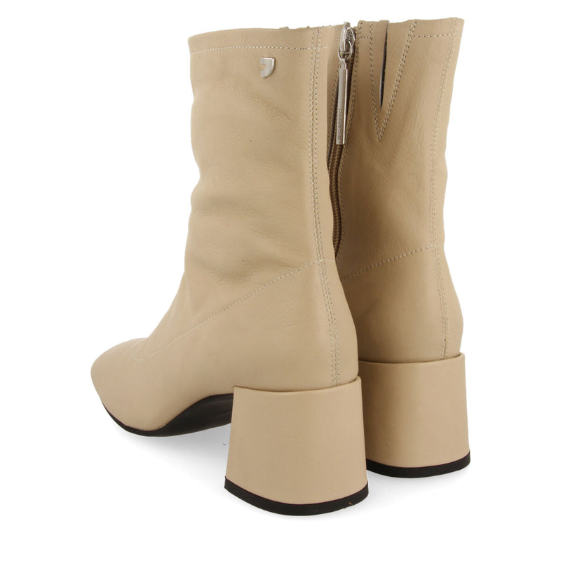Artas women's cream leather ankle boots with mid heels and round toes