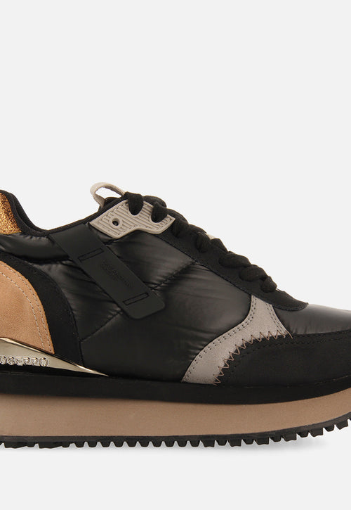 Sneakers noires monochromes rembourrées ornées de détails et talonnette invisible pour femme anif 