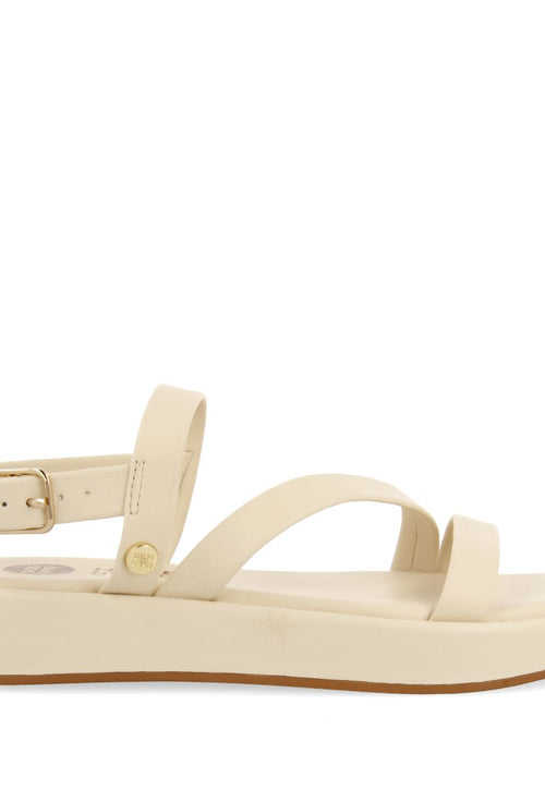 SANDALIAS COLOR OFF-WHITE DE PIEL CON TIRAS Y SUELA CON VOLUMEN PARA NIÑA Y NIÑO COULEE