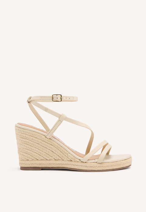 SANDALIAS OFF-WHITE DE PIEL CON TIRAS Y CUÑA ALTA DE YUTE PARA MUJER ORIKUM