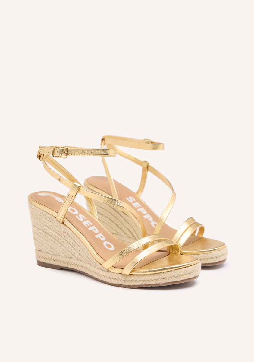 SANDALIAS DORADAS DE PIEL CON TIRAS Y CUÑA ALTA DE YUTE PARA MUJER ORIKUM
