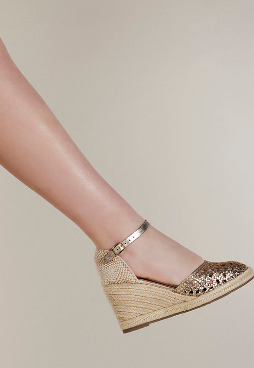 ALPARGATAS COLOR PLATINO DE PIEL TRENZADA CON CUÑA ALTA DE YUTE PARA MUJER SERIGNAN