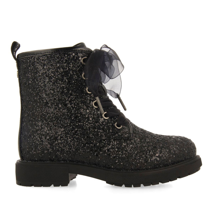 SEQUINED BOOTS AND TULLE SURANY