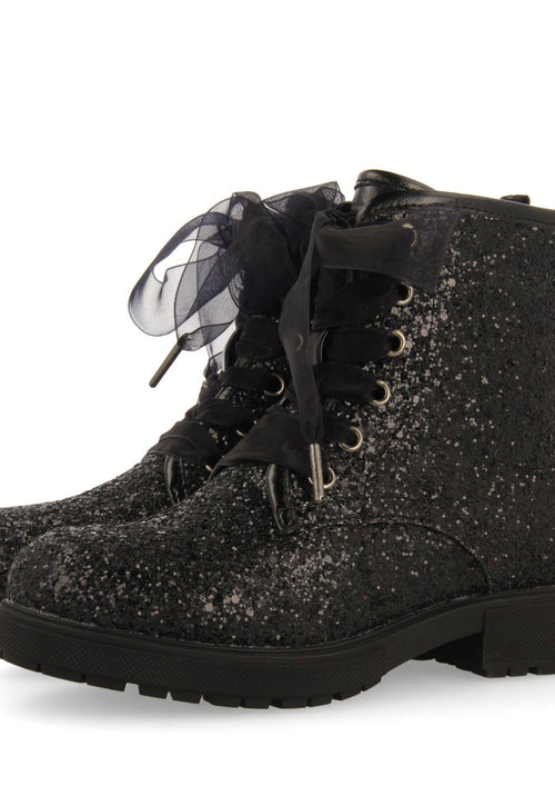 SEQUINED BOOTS AND TULLE SURANY