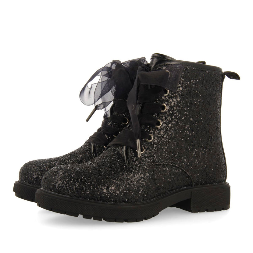 SEQUINED BOOTS AND TULLE SURANY