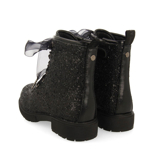 SEQUINED BOOTS AND TULLE SURANY
