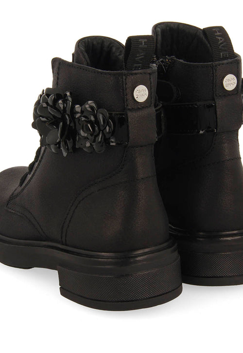 MILITARY STYLE LEATHER BOOTS WITH REMOVABLE AND REPLACEABLE STRAP.