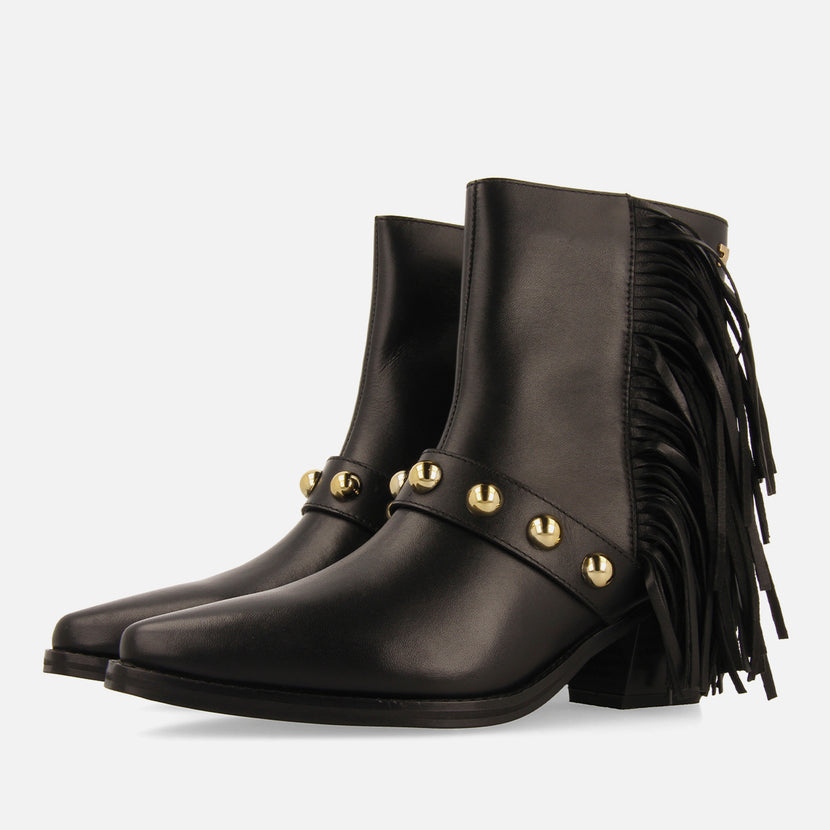 BOTINES TACÓN PIEL FLECOS Y TACHAS CLARKSVILLE