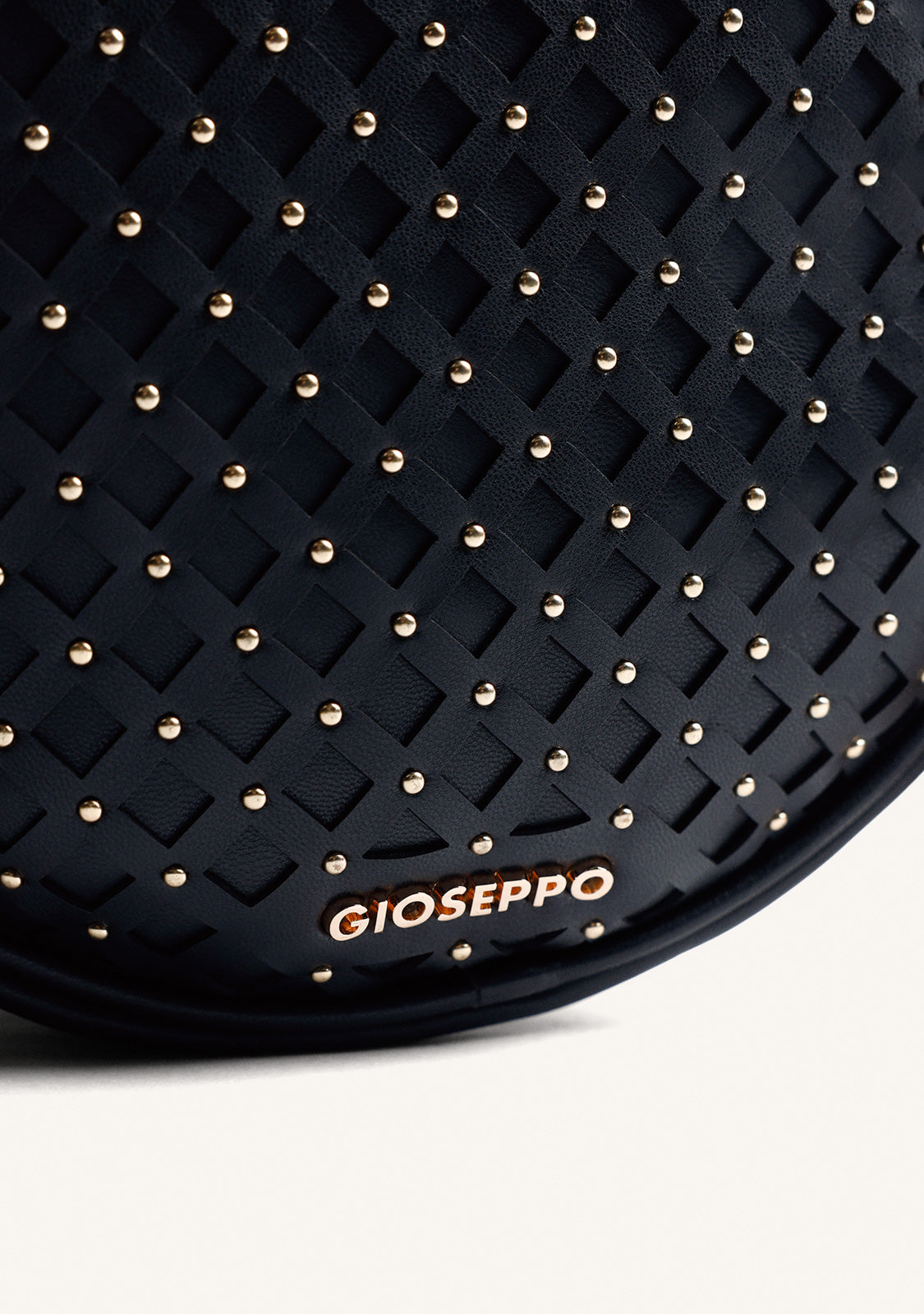 CUT-OUTS AND STUDDED CROSSBODY BAG WASCOTT