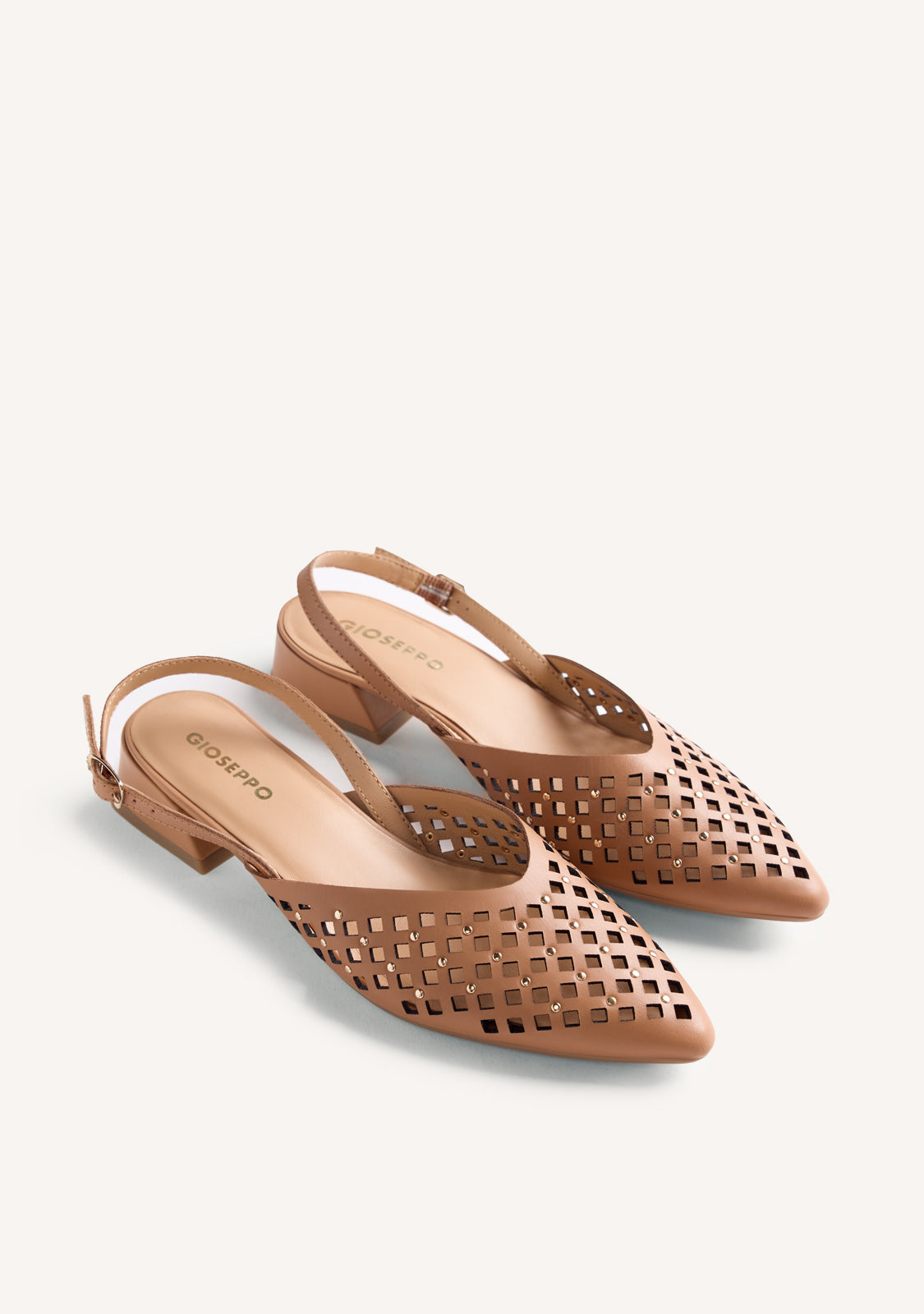 CUT-OUT AND STUDDED LEATHER HEELED SHOES LAGOS